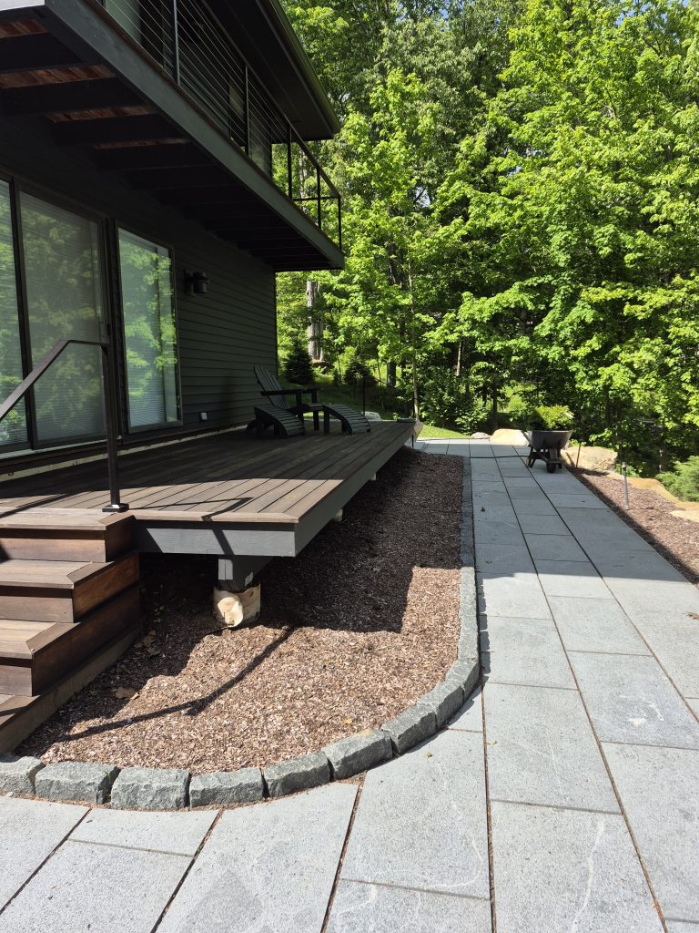 Stone pathway leading to a home entrance